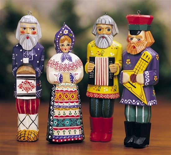 Picture of Russian Wooden Men and Women Statues. set of 4. 