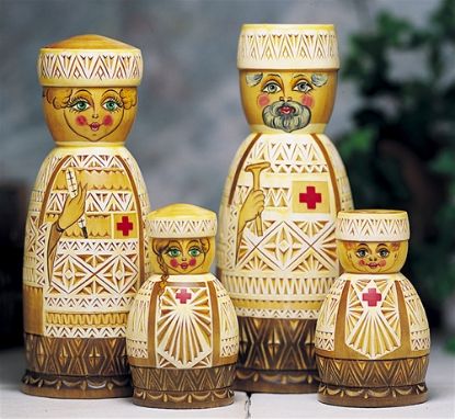 Picture of Nurse and Doctor Russian Hand  Carved Matryoshkas , 4 dolls as shown