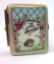 Picture of Limoges Garden Book with Wheelbarrow and Laydbug Box 